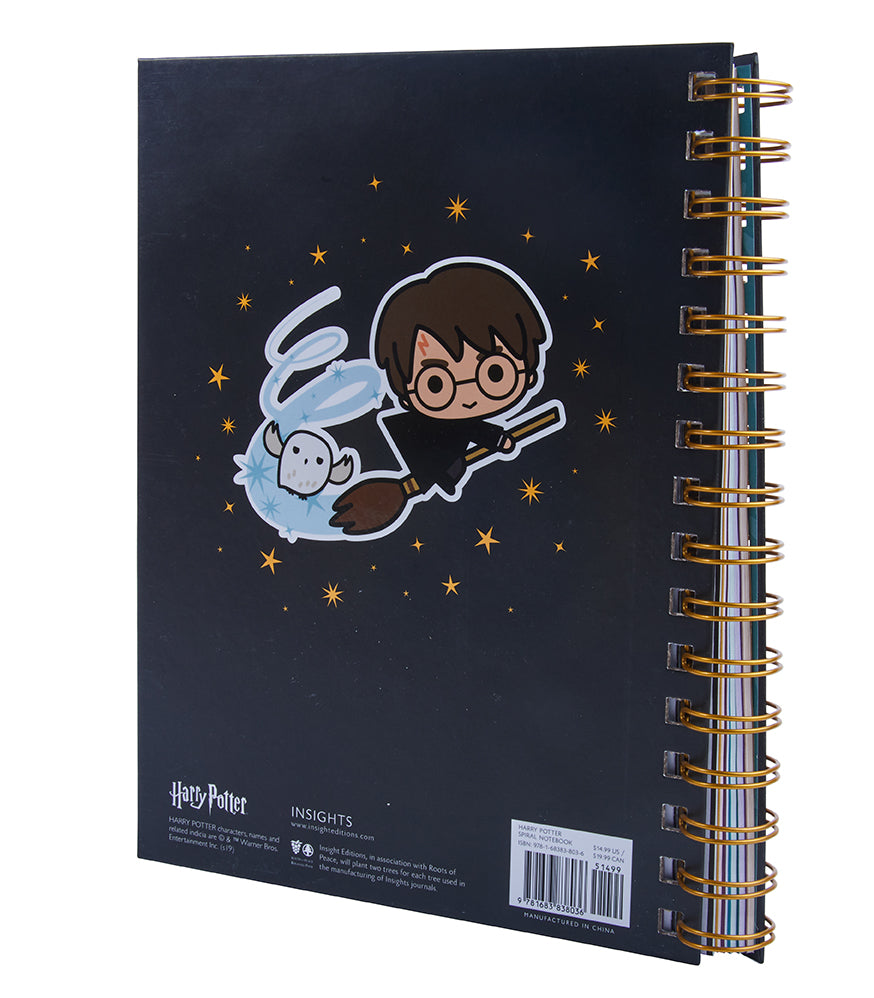 Hardcover Harry Potter spiral notebook by Insight Editions with magical-themed cover design and lined pages inside.
