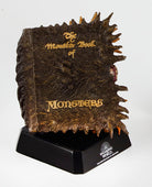 Hardcover Harry Potter Monster Book of Monsters model and book by Insight Editions with detailed cover and spine features.