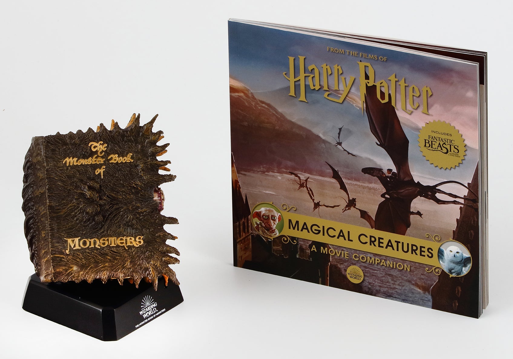 Hardcover Harry Potter Monster Book of Monsters model and book by Insight Editions, featuring the iconic creature and detailed cover artwork.