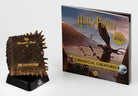 Hardcover Harry Potter Monster Book of Monsters model and book by Insight Editions, featuring the iconic creature and detailed cover artwork.