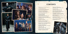 Hardcover copy of Harry Potter Wizard Duels: A Movie Scrapbook by Insight Editions, featuring magical duel illustrations and film memorabilia.