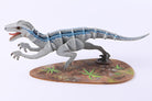 Hardcover Jurassic World Raptor book and 3D wood model by IncrediBuilds, featuring detailed raptor design from Insight Editions.