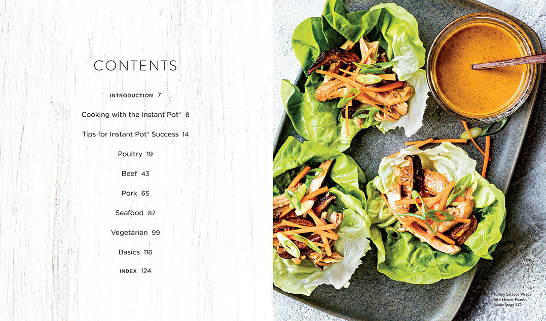 Hardcover book titled "Instant Pot Family Meals" by Insight Editions, featuring colorful images of delicious home-cooked dishes.