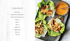 Hardcover book titled "Instant Pot Family Meals" by Insight Editions, featuring colorful images of delicious home-cooked dishes.