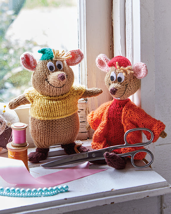 Hardcover book titled "Knitting with Disney" by Insight Editions showing colorful Disney-themed knitting patterns and supplies.