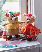 Hardcover book titled "Knitting with Disney" by Insight Editions showing colorful Disney-themed knitting patterns and supplies.
