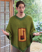 Hardcover book titled "Knitting with Disney" by Insight Editions showcasing colorful Disney-themed knitting projects.