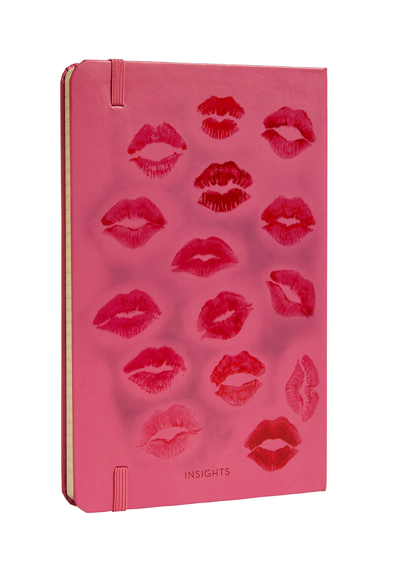 Hardcover "Mean Girls" Burn Book journal by Insight Editions with ruled pages and themed cover design.