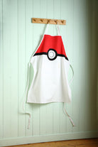 Hardcover My Pokemon Cookbook Gift Set with Poke Ball apron from Insight Editions, featuring colorful Pokemon-themed design.