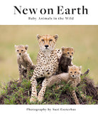 Hardcover book titled "New on Earth" by Insight Editions with a natural landscape cover image.