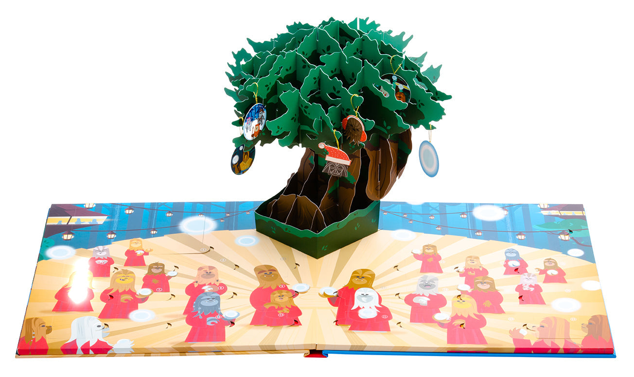 Hardcover Star Wars Life Day pop-up book and advent calendar by Insight Editions, featuring detailed holiday-themed illustrations.
