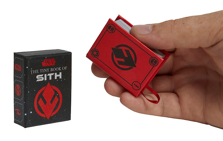 Hardcover copy of Star Wars: The Tiny Book of Sith by Insight Editions, featuring a dark-themed cover with Sith imagery.