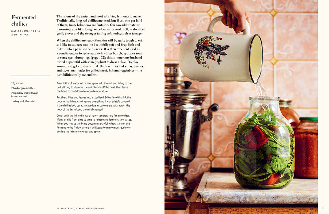 Hardcover book titled Summer Kitchens by Insight Editions featuring outdoor cooking and patio design images