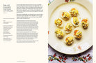 Hardcover book titled Summer Kitchens by Insight Editions featuring vibrant outdoor kitchen designs and summer cooking ideas.