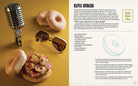 Open hardcover of Supernatural: The Official Cookbook by Insight Editions, featuring colorful illustrated recipes inside.