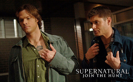 Inside view of the hardcover Supernatural: The Postcard Collection by Insight Editions, showcasing collectible postcards and artwork.