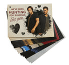 Inside view of hardcover Supernatural Valentine's Day blank boxed note cards by Insight Editions, featuring themed designs.