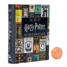 Inside view of "The Art of Harry Potter" hardcover book by Insight Editions, showcasing detailed graphic design illustrations.