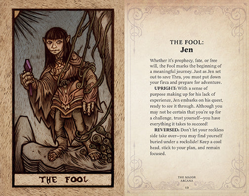 Interior view of the hardcover The Dark Crystal Tarot Deck and Guidebook by Insight Editions, featuring detailed tarot card illustrations.