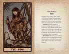 Interior view of the hardcover The Dark Crystal Tarot Deck and Guidebook by Insight Editions, featuring detailed tarot card illustrations.