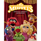 Hardcover book titled "The Muppets Official Crochet Amigurumi" by Insight Editions, featuring colorful Muppet character illustrations.