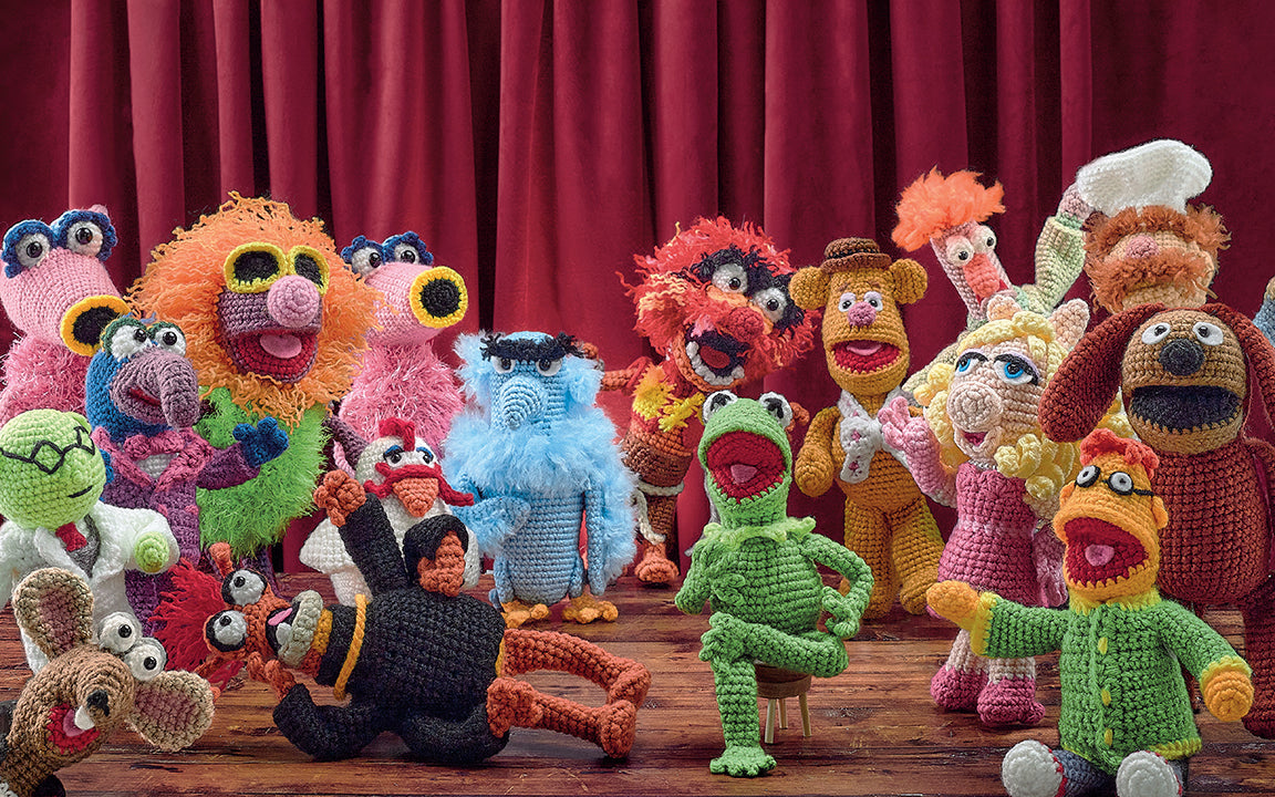 Hardcover book titled "The Muppets Official Crochet Amigurumi" by Insight Editions, featuring colorful Muppet characters on the cover.