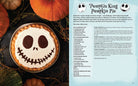Hardcover baking cookbook featuring The Nightmare Before Christmas by Insight Editions, with spooky-themed baking recipes and illustrations.