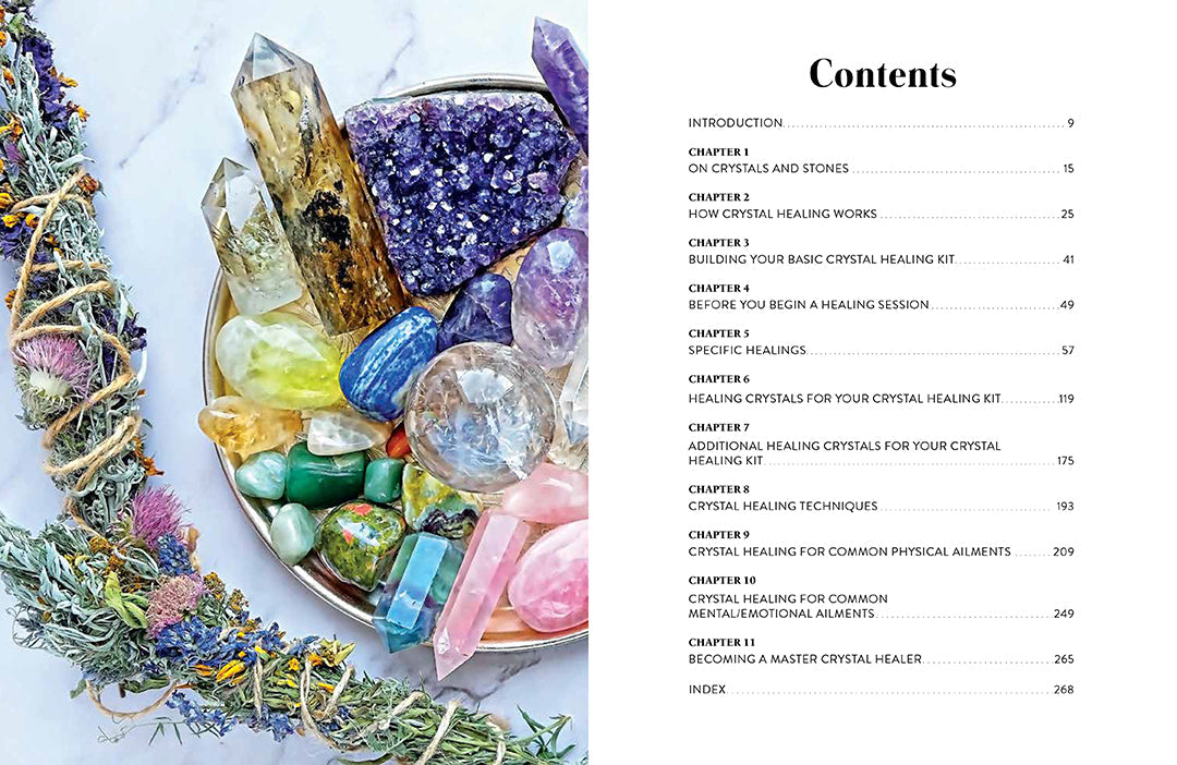 Open hardcover book titled "The Power of Crystal Healing" by Insight Editions, featuring colorful crystal illustrations inside.