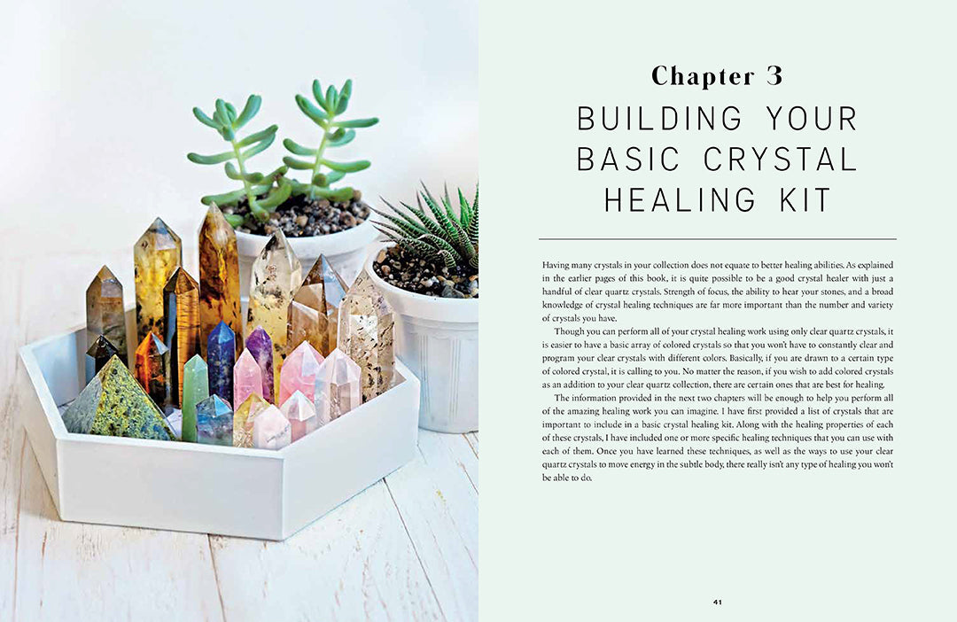 Open hardcover book titled "The Power of Crystal Healing" by Insight Editions, showing colorful crystal illustrations inside.
