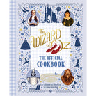 Hardcover copy of The Wizard of Oz: The Official Cookbook by Insight Editions featuring colorful cover art.