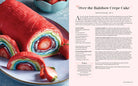 Inside pages of The Wizard of Oz official hardcover cookbook by Insight Editions, featuring colorful illustrations and recipes.