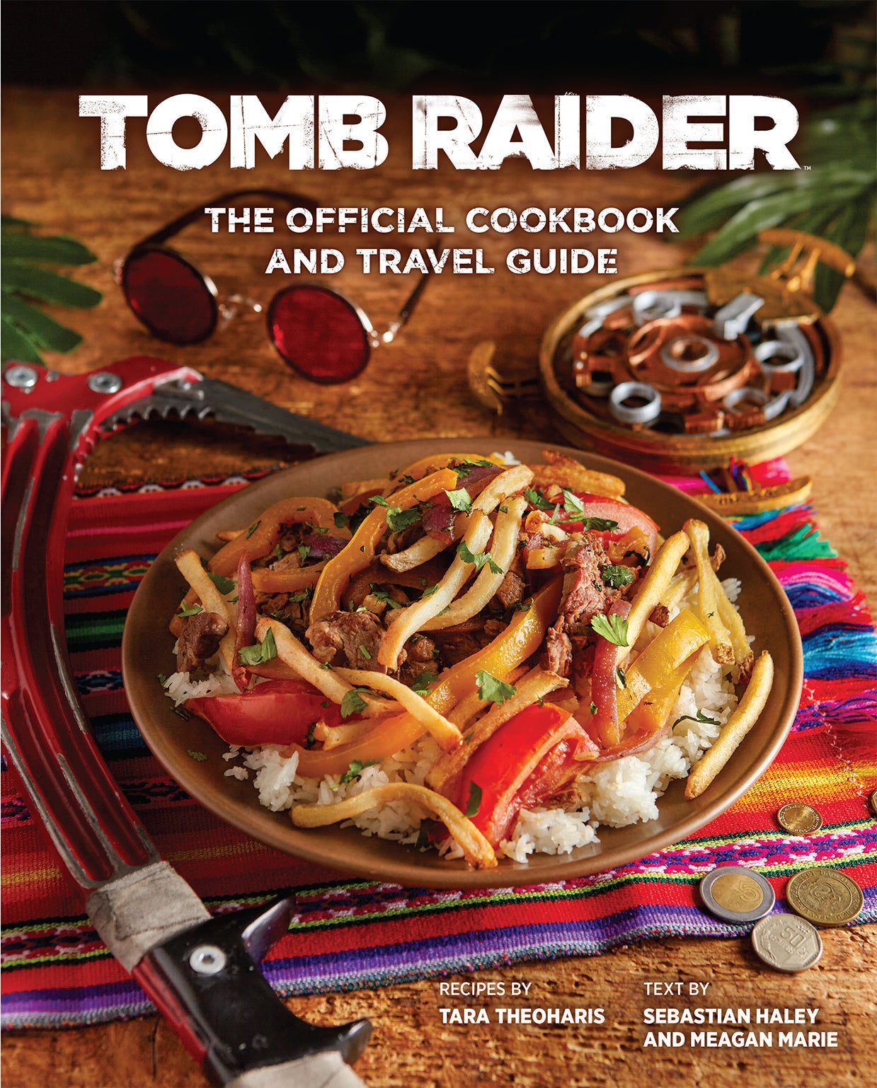 Hardcover of Tomb Raider: The Official Cookbook and Travel Guide by Insight Editions, featuring a colorful cover with adventure-themed artwork.