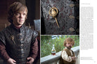 Hardcover book with jacket titled "Game of Thrones: The Costumes" by Insight Editions, showcasing detailed costume designs and artwork.
