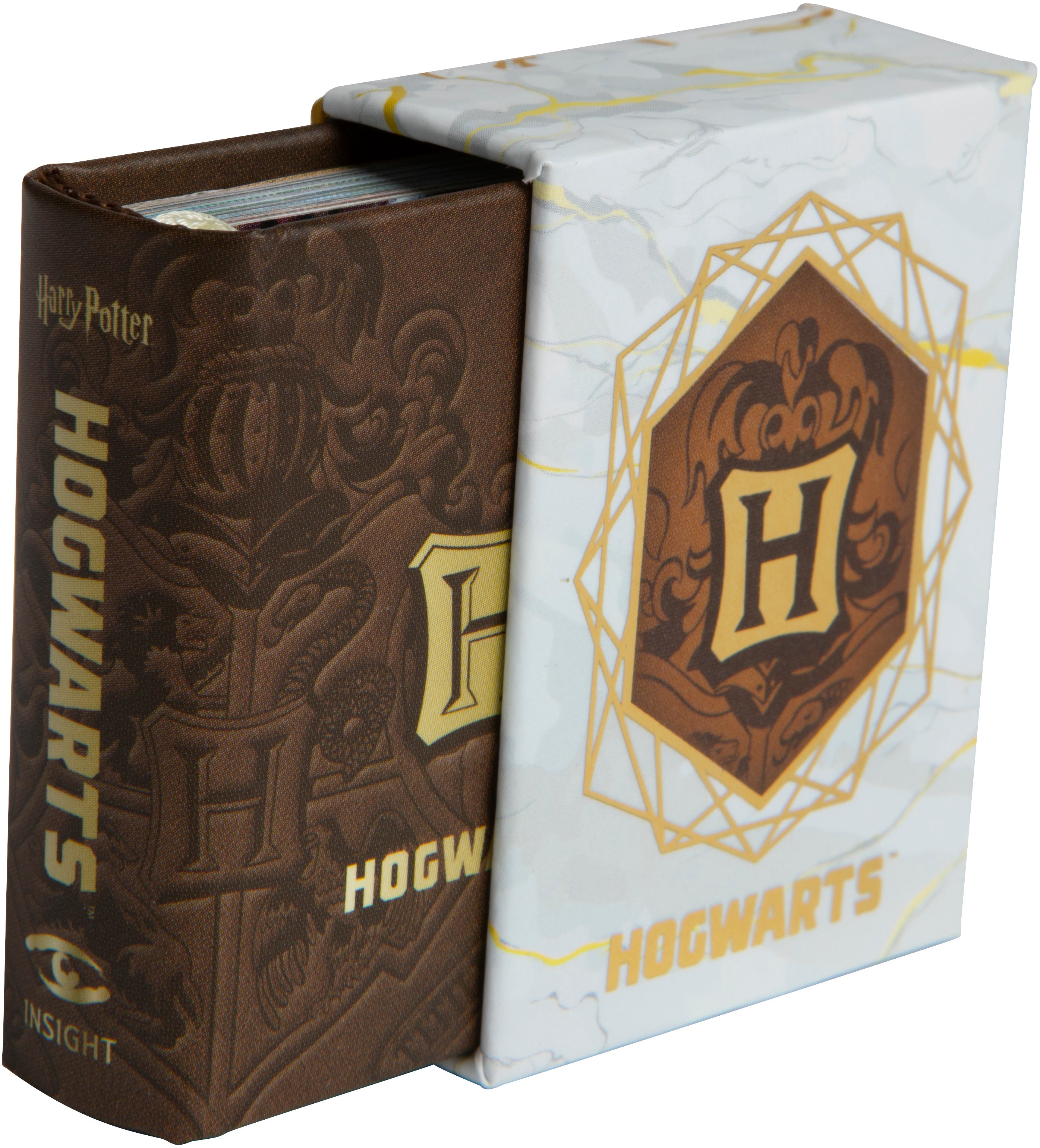 Hardcover Harry Potter Hogwarts School of Witchcraft and Wizardry book with jacket by Insight Editions, featuring magical design.