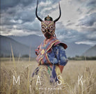 Hardcover book with jacket titled "Mask" by Insight Editions, featuring a detailed cover design and text on the front.