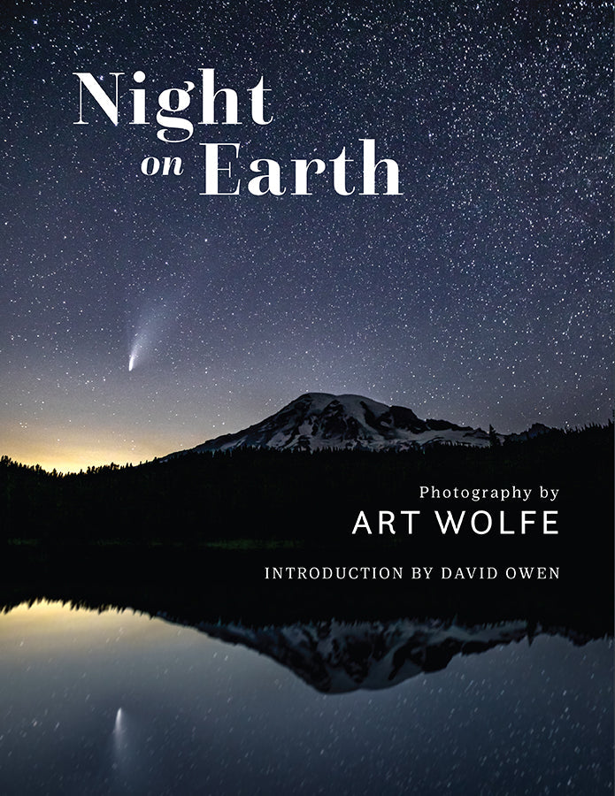 Hardcover book "Night on Earth" with jacket cover by Insight Editions, featuring a nighttime scene of the Earth from space.