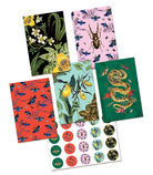 Set of 20 botanical art cards in a portfolio, featuring nature-themed illustrations, from the Art of Nature by Insight Editions.