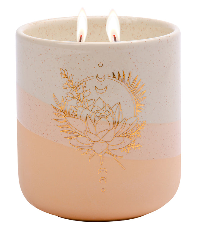 Insight Editions Calm scented candle in an 11 oz. jar, perfect for creating a relaxing home ambiance with soothing aromas.