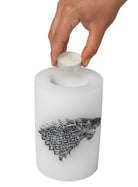 Sculpted House Stark sigil candle from Game of Thrones, featuring the Stark wolf emblem in detailed white wax.
