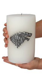 Sculpted House Stark sigil candle from Game of Thrones, featuring a detailed direwolf design, ideal for home decor.