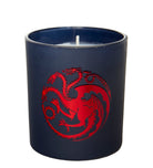 Targaryen house glass candle from Game of Thrones, featuring a detailed dragon design, in a clear glass holder.