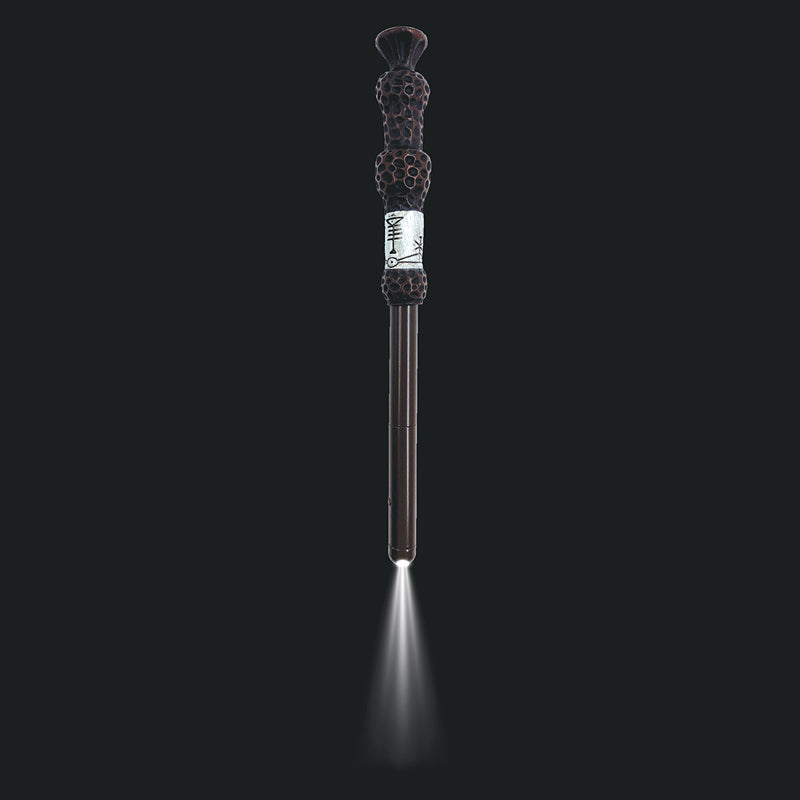 Harry Potter Elder Wand illuminating wand pen by Insight Editions, featuring a detailed wand design with LED light.