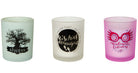 Set of Harry Potter glass votive candles from Insight Editions, featuring magical designs for home decor.