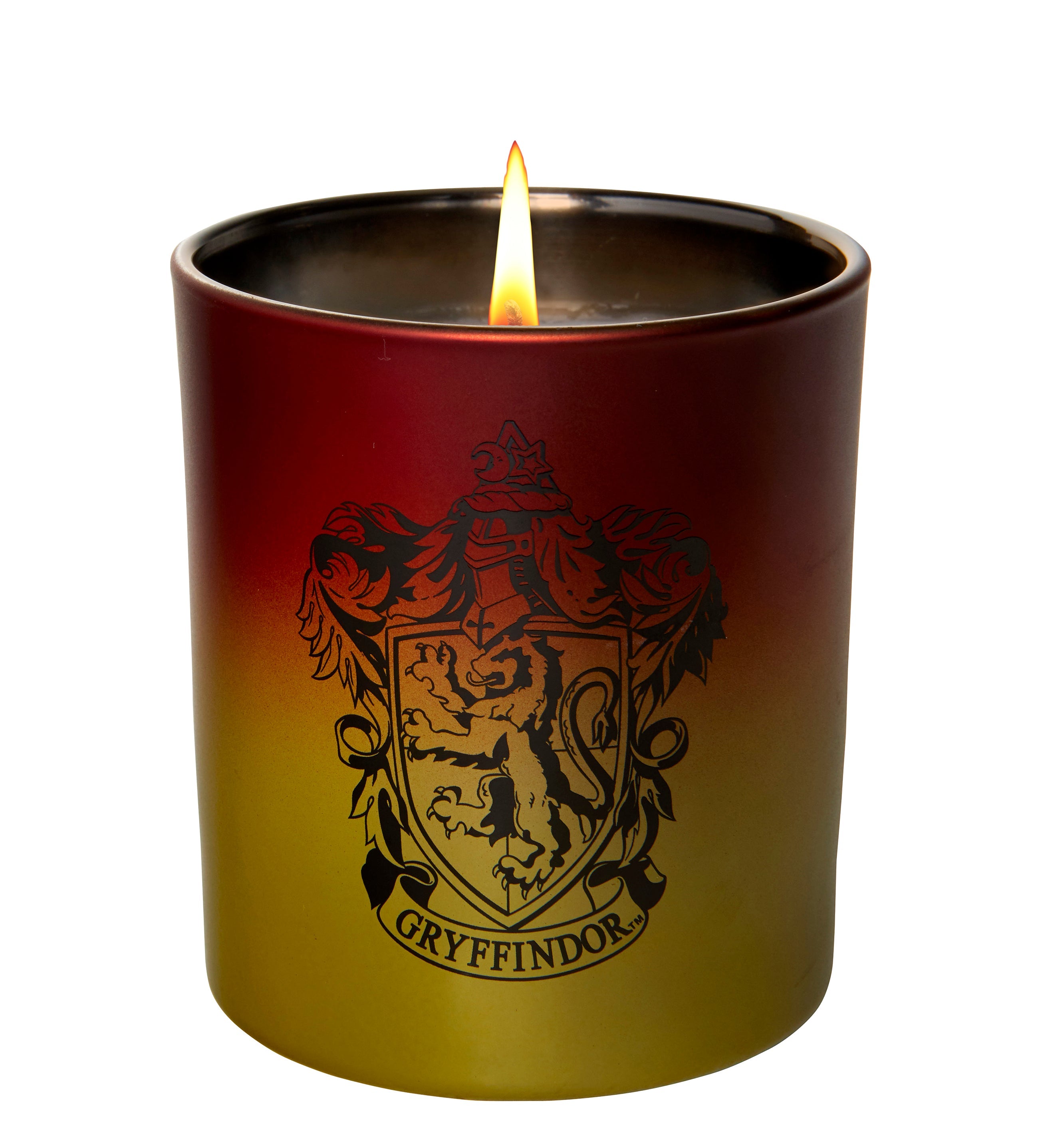 Gryffindor glass candle from Harry Potter home goods by Insight Editions, featuring a decorative glass container with Gryffindor emblem.