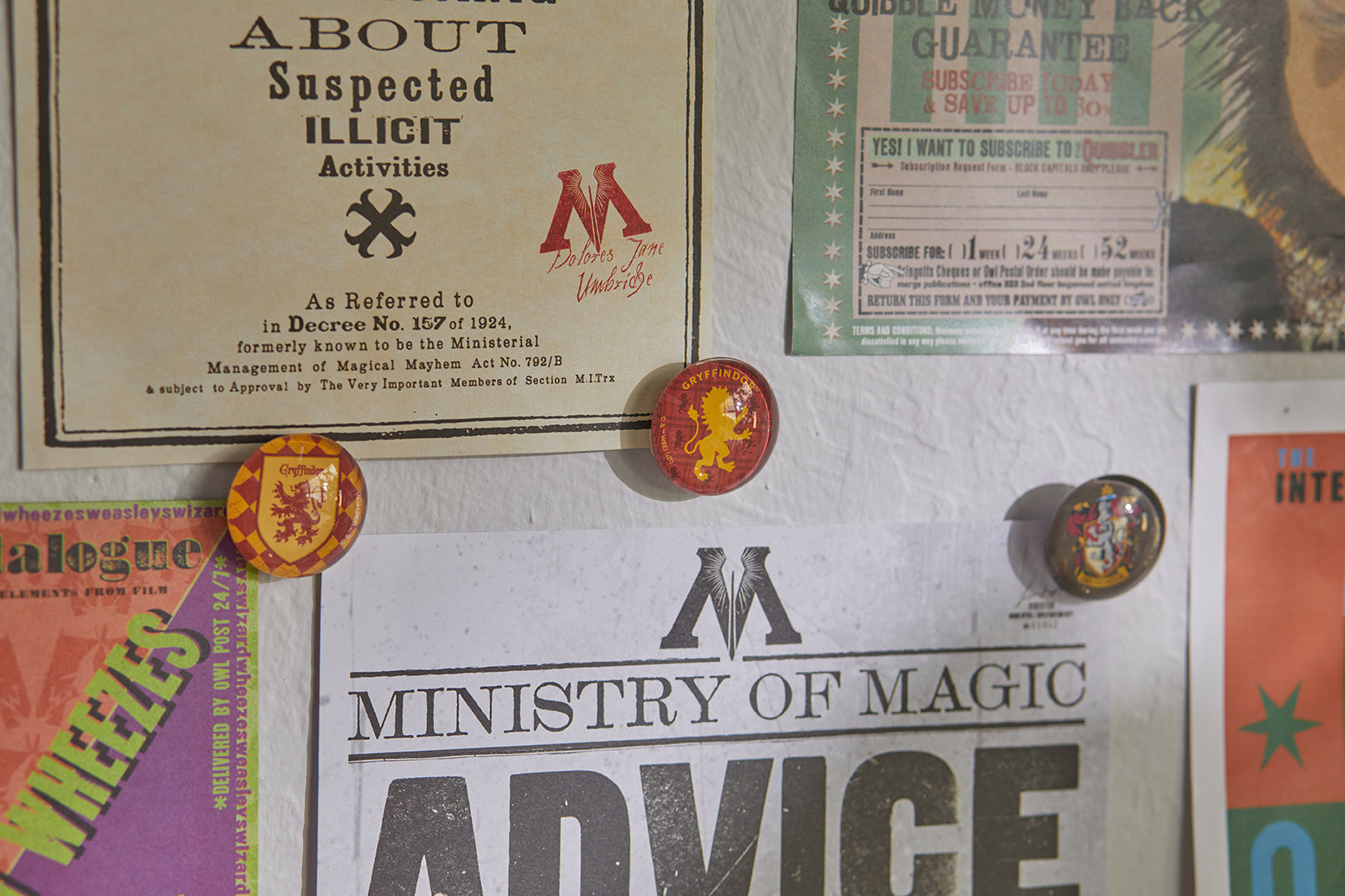Set of six Gryffindor glass magnets from Harry Potter, featuring house crest and emblem, for home decor or magnetic surfaces.