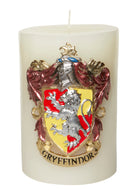 Gryffindor insignia sculpted candle from Harry Potter, Insight Editions home decor featuring detailed house emblem design.