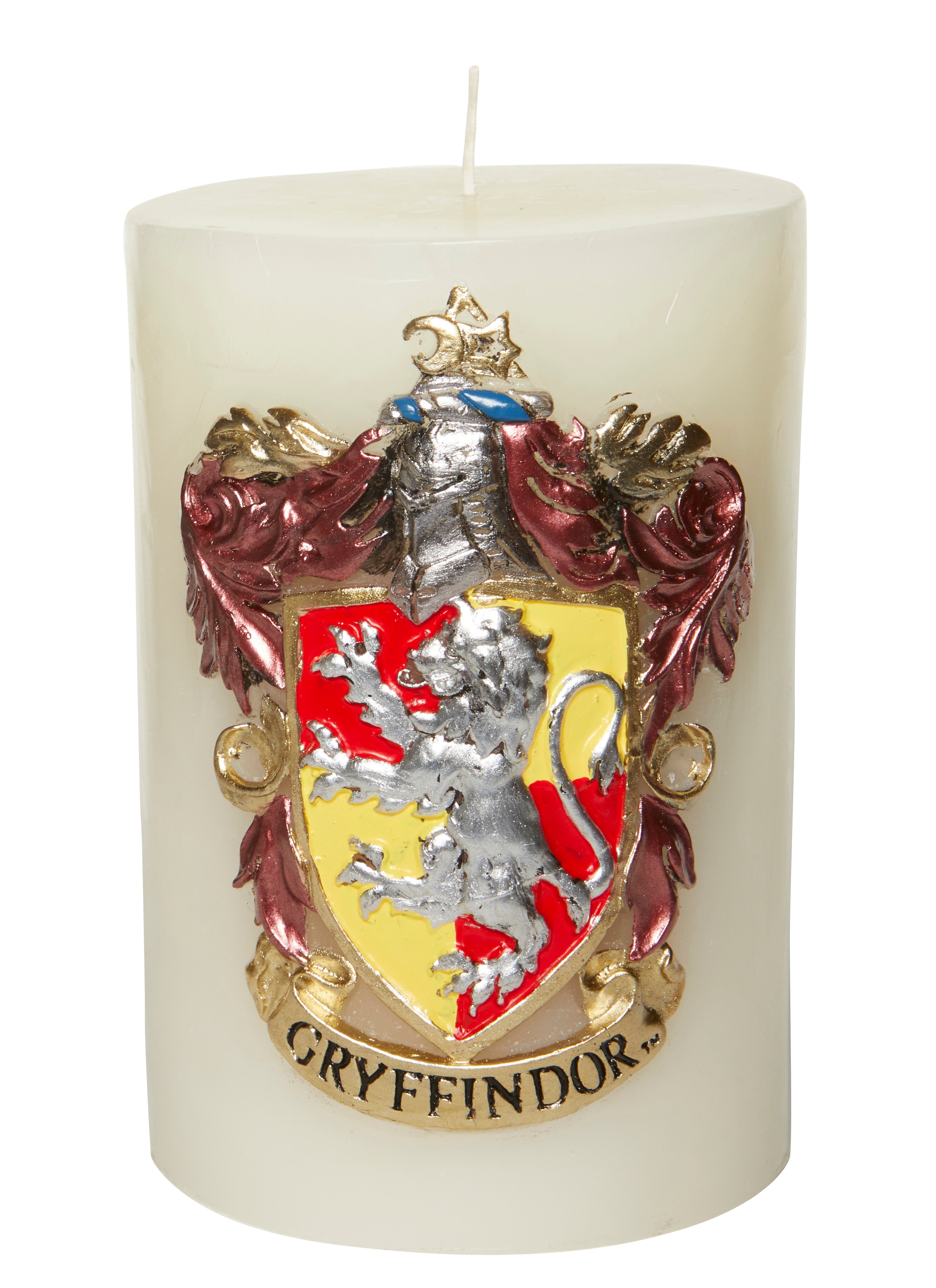 Gryffindor insignia sculpted candle from Harry Potter, Insight Editions home decor featuring detailed house emblem design.