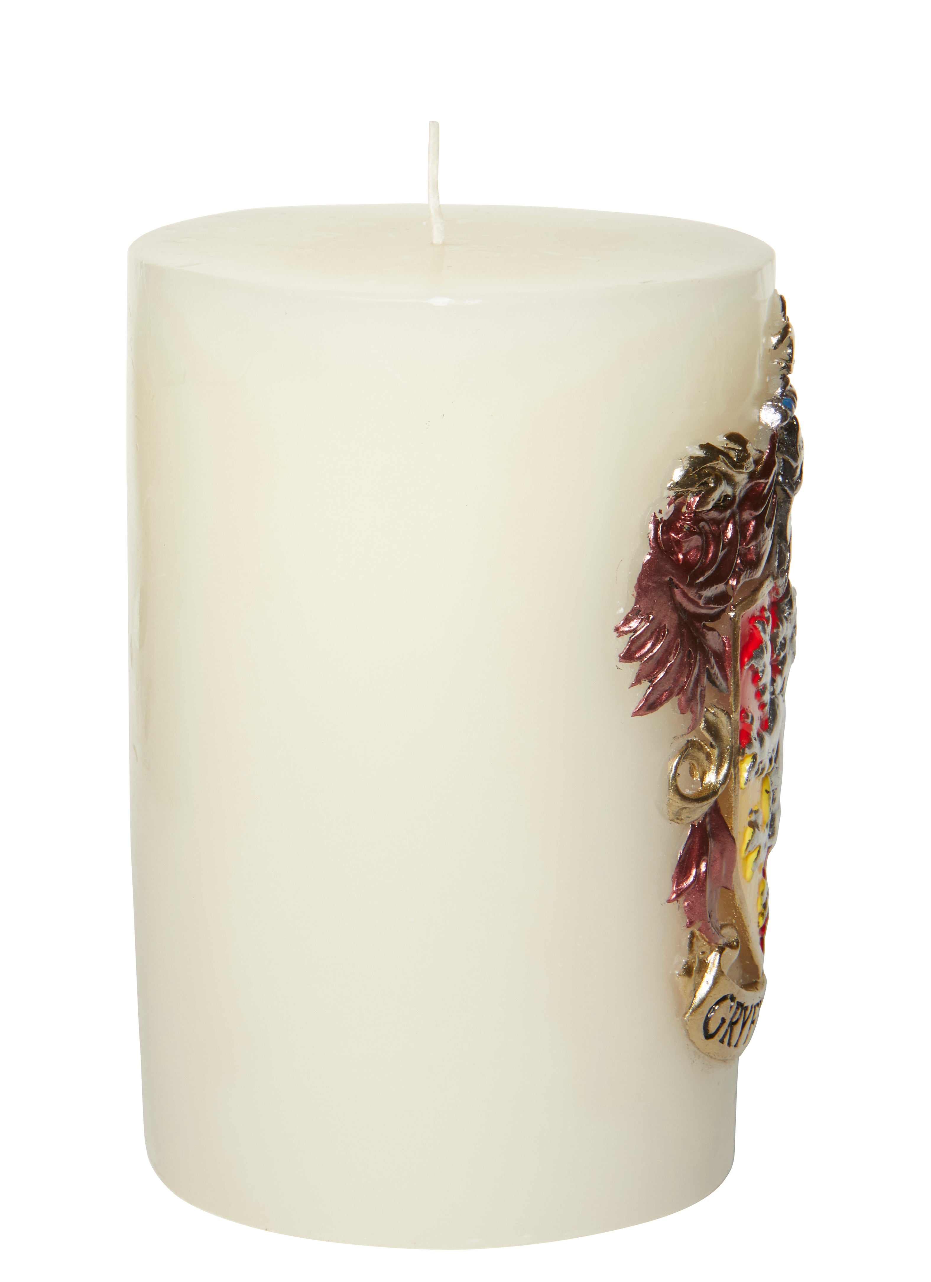 Gryffindor sculpted insignia candle from Harry Potter, Insight Editions home goods featuring detailed house crest design.
