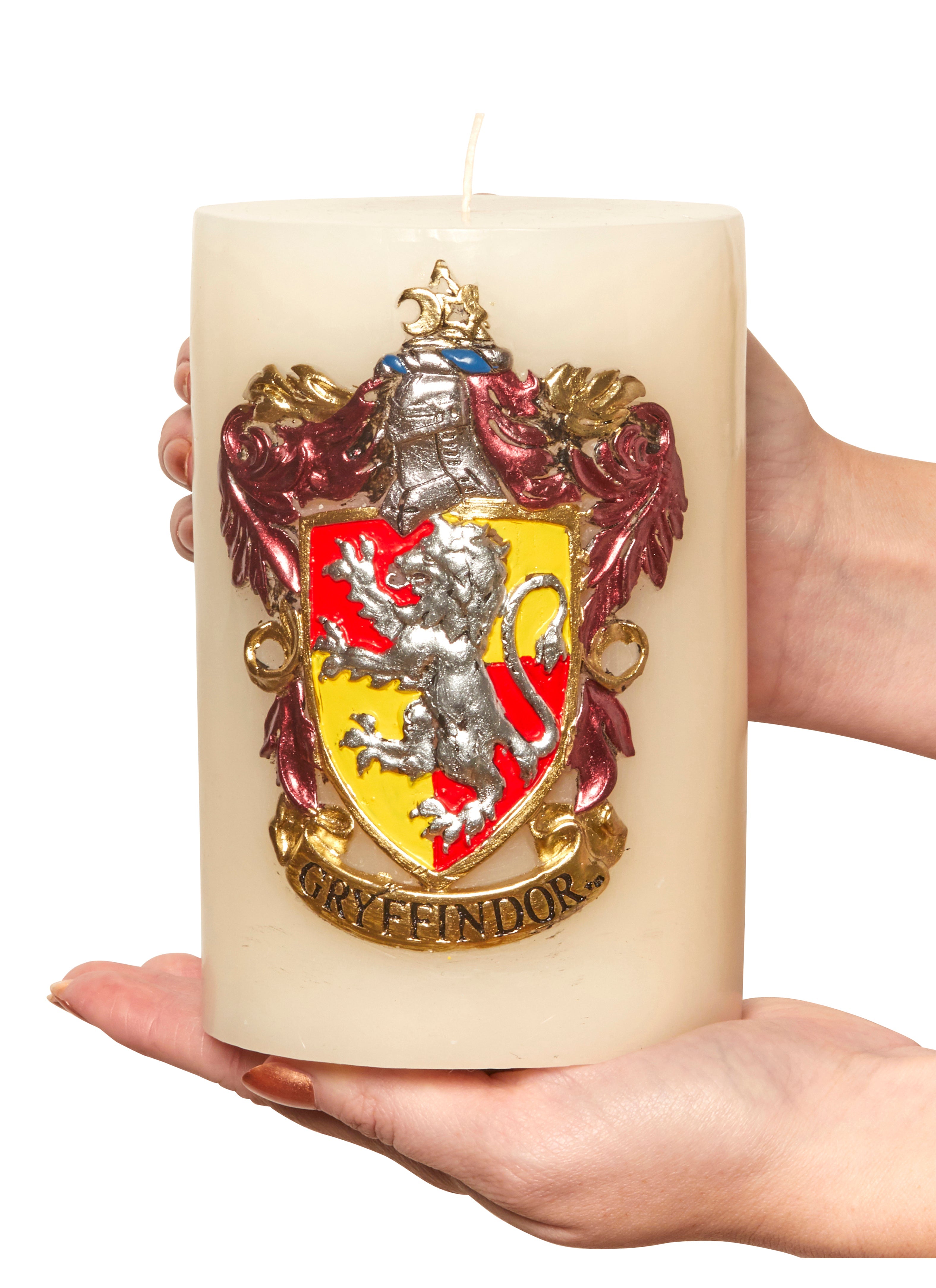 Gryffindor crest sculpted insignia candle from Harry Potter, featuring detailed house emblem, ideal for home decor.