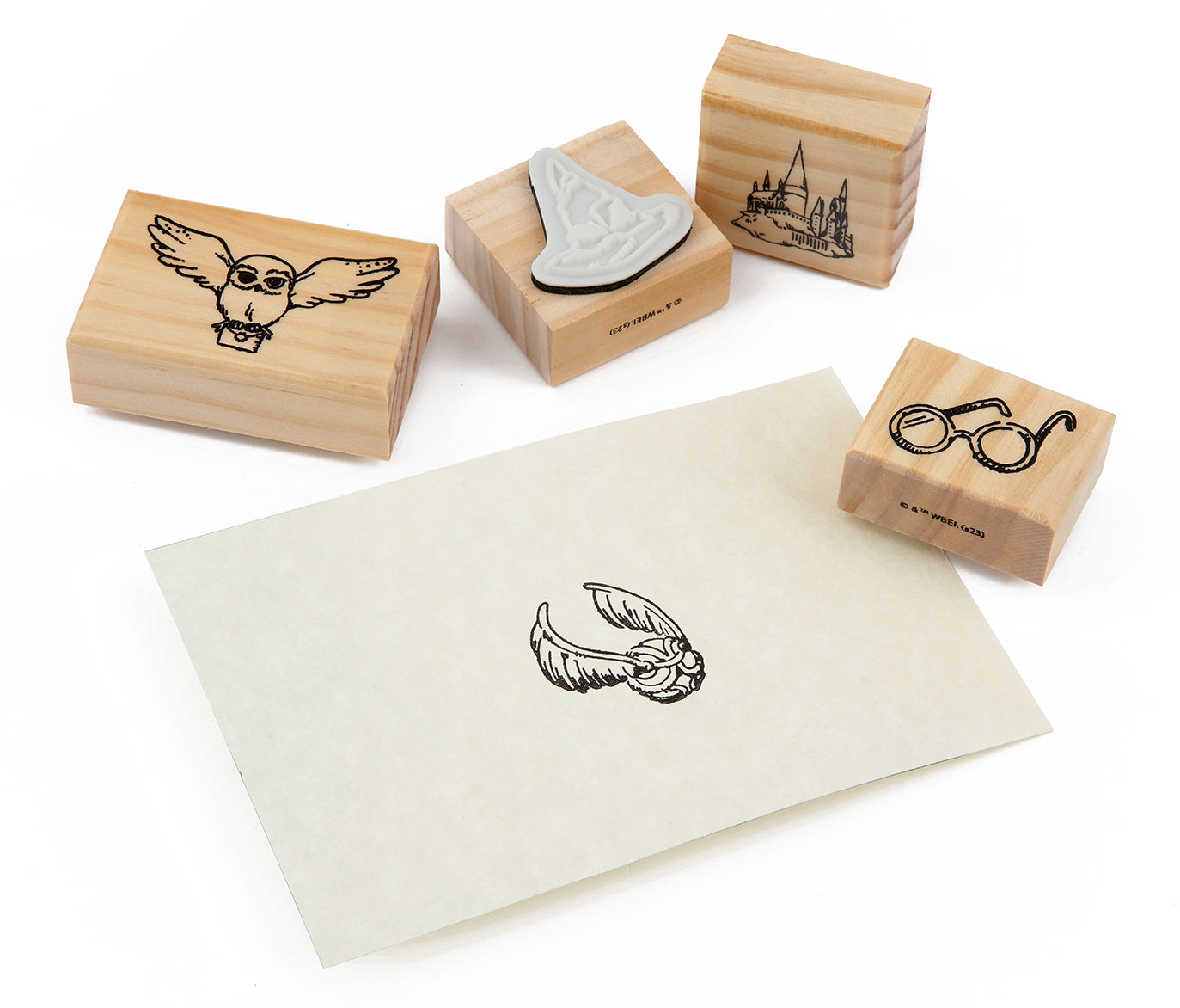 Harry Potter Hogwarts Magical Moments rubber stamp set featuring magical symbols and characters from the Harry Potter series.